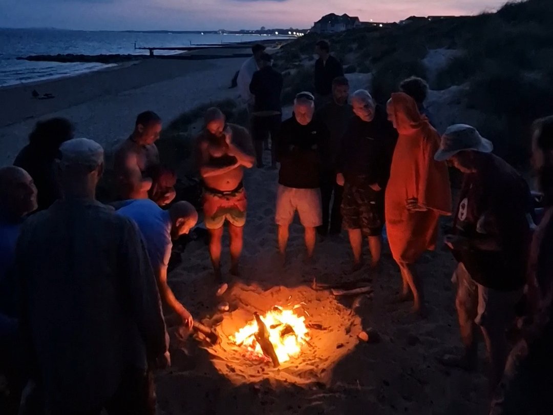 The circle on the beach at dusk