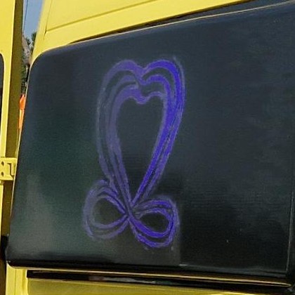 The purple mark, on the van