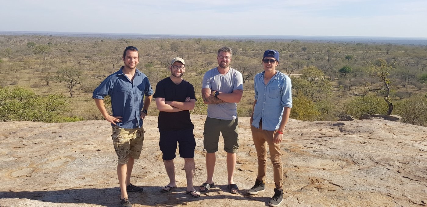 A team standing together on high ground